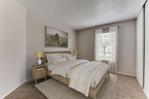 Bedroom with wood furniture and natural light at Arbors Of Corsicana Apartments, Texas