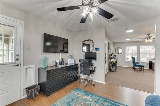 Home office area with reception desk and furniture at Arbors Of Corsicana Apartments, Corsicana, TX 75110