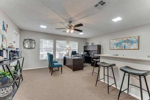 Home office with desk and breakfast bar seating at Arbors Of Corsicana Apartments, Corsicana, TX