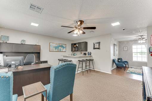Community business center with bar seating at Arbors Of Corsicana Apartments, Corsicana