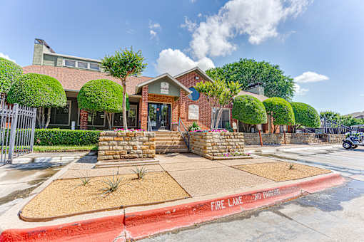 A house with a red fire lane sign in front.