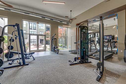 Fitness center with strength equipment at The Barton Apartments, Texas, 75206