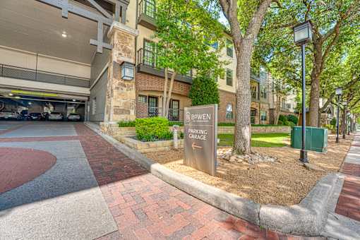 A parking garage entrance with a sign that says "Bowen Parking Garage".