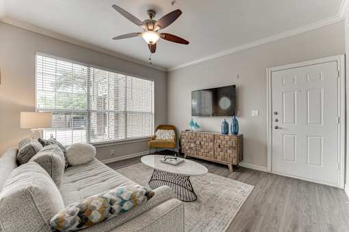 Living Room With TV at The Brazos, Dallas, Texas