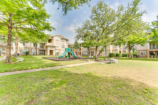 A playground at The Brazos, Dallas, TX, 75287