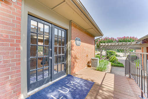 A blue mat with the word at Copper Hill Apartments, Bedford, Texas