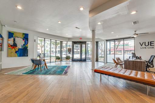 Modern leasing office lobby with floor to ceiling windows at Vue Live Oak Apartments, Texas, 75204