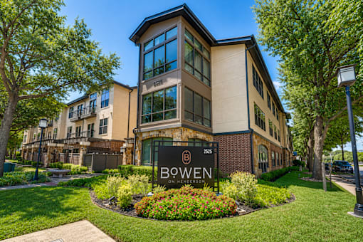 A building with a sign that says Bowen in front of it.