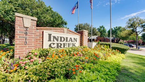 Welcoming Property Signage at Indian Creek Apartments, Texas, 75007