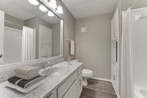 Bathroom With Bathtub at The Manhattan Apartments, Dallas