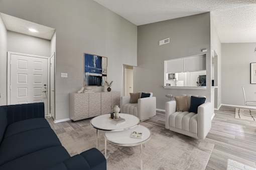 Living Room With Kitchen View at The Manhattan Apartments, Dallas
