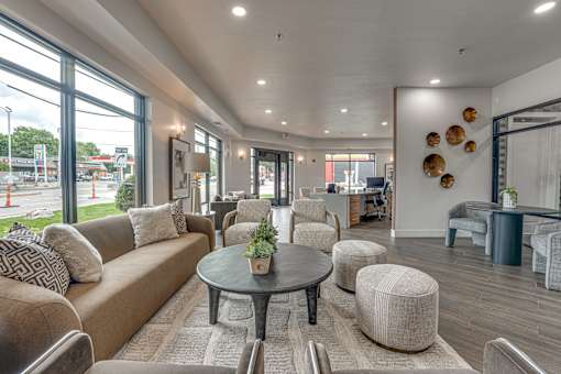 Bright lobby with seating and reception area at The Montrose Apartments, Texas