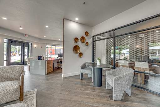 Leasing office lobby with reception desk and seating at The Montrose Apartments, Texas, 75204