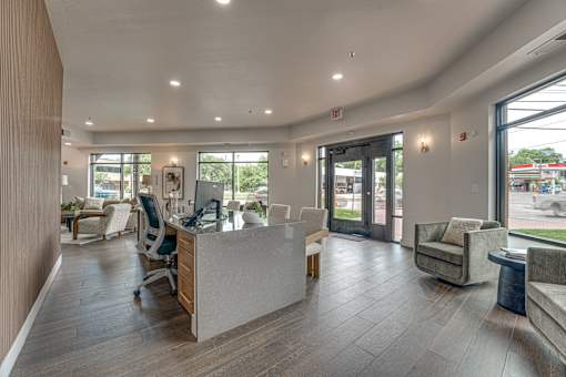 Leasing office with reception desk and seating area at The Montrose Apartments, Dallas, 75204