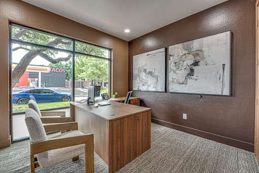 Private office with street view and abstract art at The Montrose Apartments, Dallas