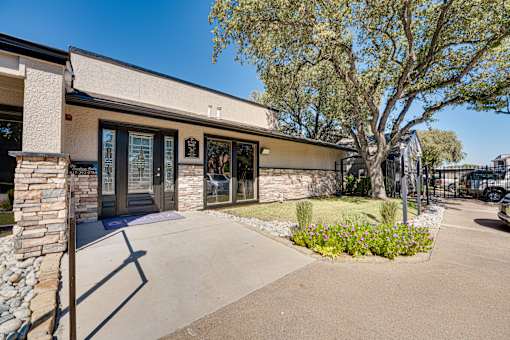 building with a stone pillar at Southern Oaks, Fort Worth   