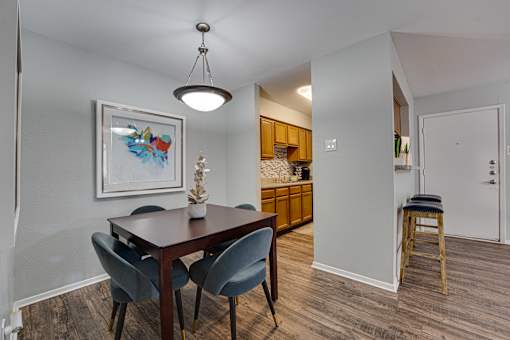 dining room with a wooden table and chairs at Southern Oaks, Fort Worth Texas