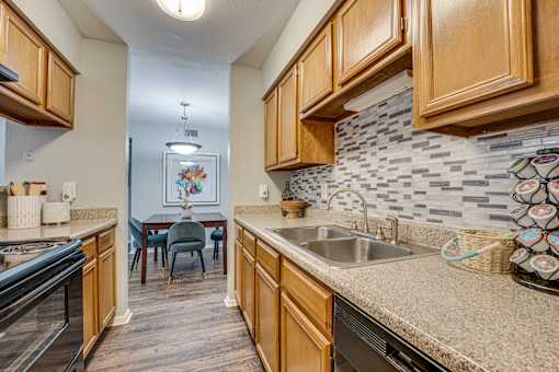 kitchen with wooden cabinets at Southern Oaks, Fort Worth, 76132