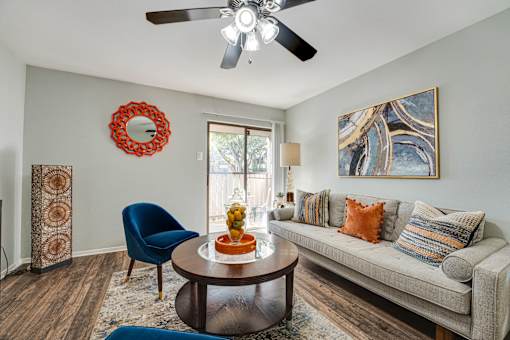 Couch table and round table in room at Southern Oaks, Fort Worth Texas