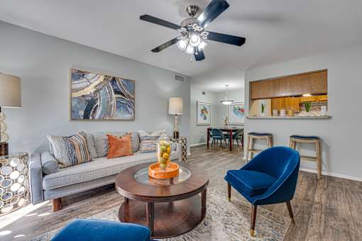 living room with painting on the wall at Southern Oaks, Fort Worth, TX