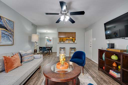 coffee table, and a ceiling fan in living room at Southern Oaks, Fort Worth, TX 76132  