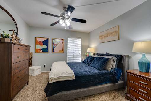 Blue bed in a bedroom at Southern Oaks, Fort Worth, 76132  