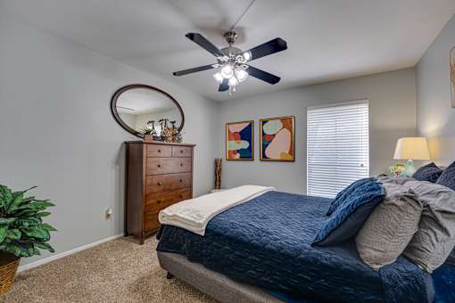 bedroom with a bed and cushion at Southern Oaks, Texas