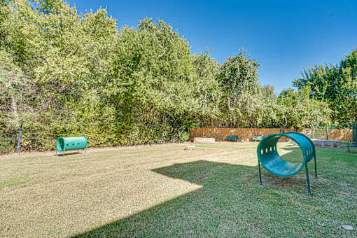 playground with a green slide at Southern Oaks, Fort Worth Texas