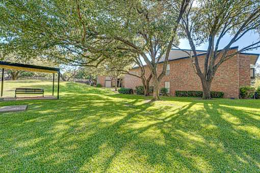 backyard with a lawn at Southern Oaks, Texas, 76132