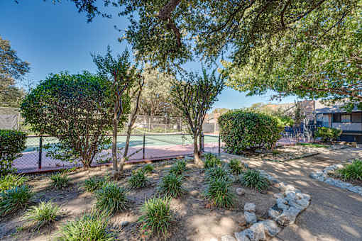 backyard with a tennis court at Southern Oaks, Texas, 76132