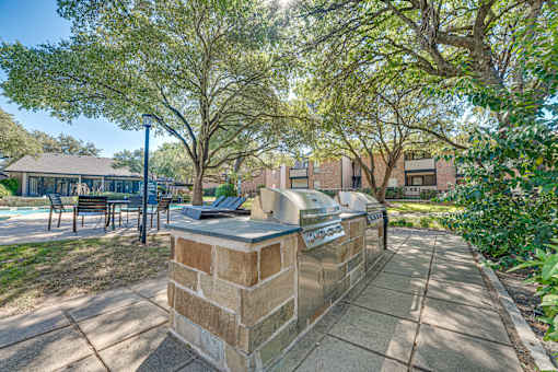 brick pillar with a planter at Southern Oaks, Texas