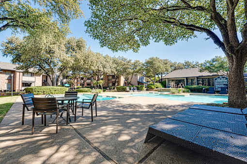 pool surrounded by trees at Southern Oaks, Fort Worth, TX