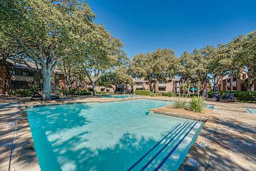 swimming pool surrounded by houses at Southern Oaks, Fort Worth, 76132