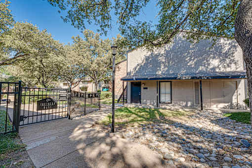 house with a black gate at Southern Oaks, Texas, 76132