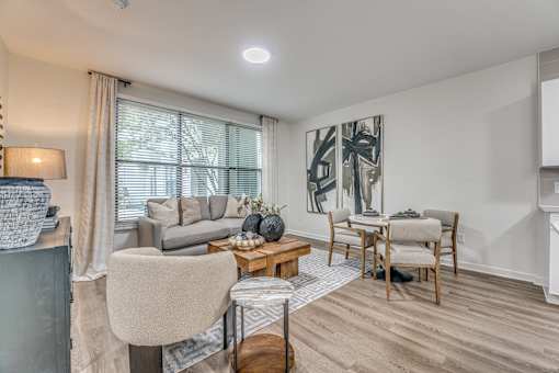 Open concept living and dining room with natural light at The Barton Apartments, Dallas, 75206