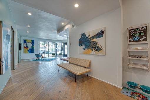 Spacious lobby with modern seating at Vue Live Oak Apartments, Dallas, TX
