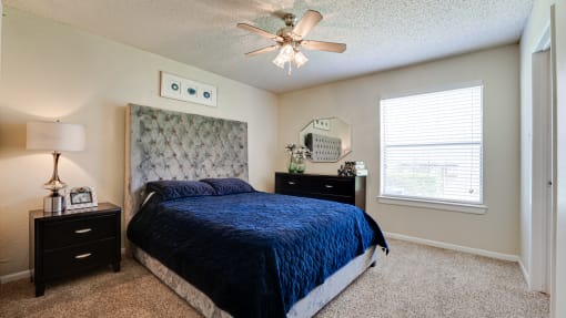 Bedroom With Ceiling Fan at Woodland Hills, Irving, TX, 75062