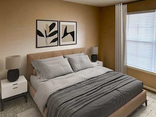 Spacious bedroom featuring modern decor and natural lighting