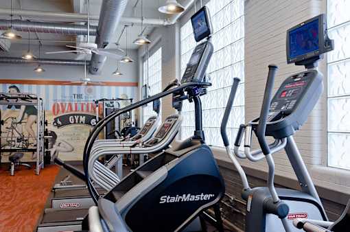 cardio machines in the fitness center at Ovaltine Court Apartments