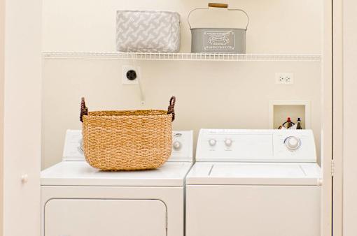 a laundry room with a washer and dryer