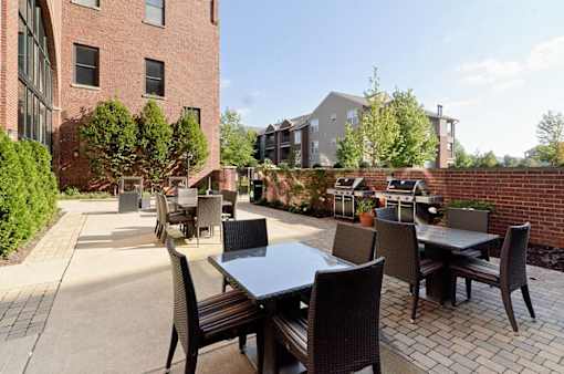 Inviting patio space with grilling and dining area