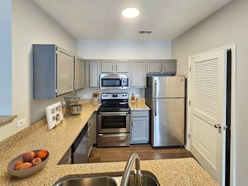 Kitchen with modern appliances and ample counter space