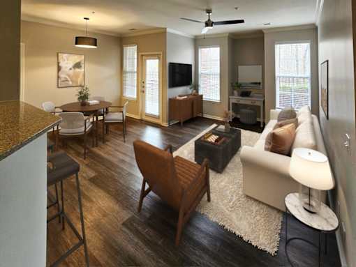 Open-concept living space with elegant furnishings and natural light