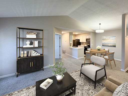 A living room with a black coffee table and a white chair.