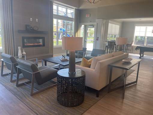 A living room with a fireplace and a couch.