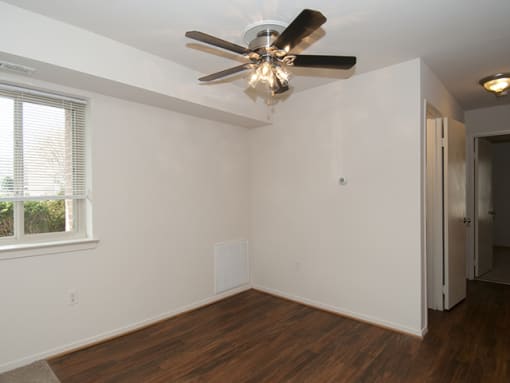 Dining space with ceiling fan and vinyl flooring
