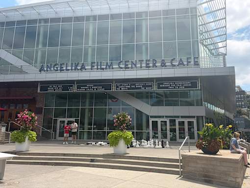 The exterior of the Angelika Film Center & Cafe with people walking in front.