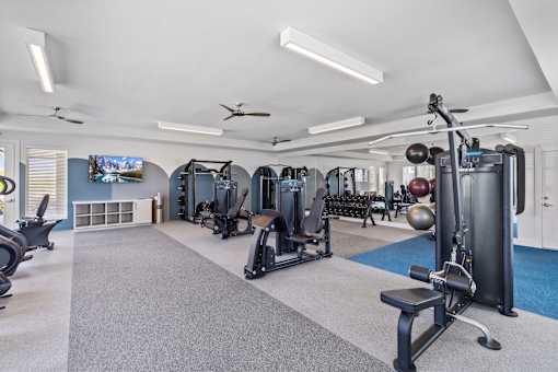 24-hour fitness center with cardio and strength equipment at The Esther.