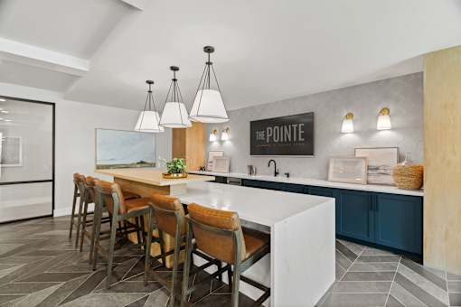 Modern community lounge showcasing communal seating, upscale interior finishes, and thoughtfully designed resident gathering spaces.