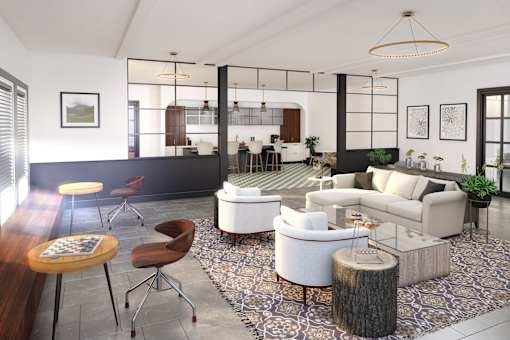 A modern living room with a white sofa set and a wooden coffee table.